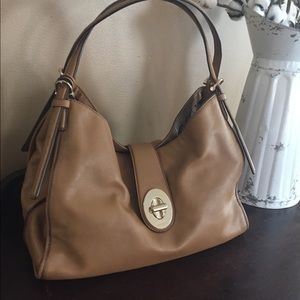 Coach leather tan authentic purse.
